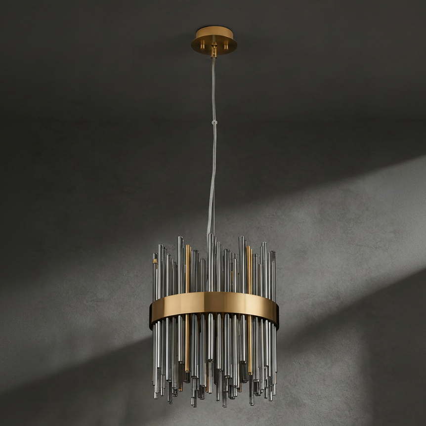 Round chandelier with a gold band and clear and gold glass rods