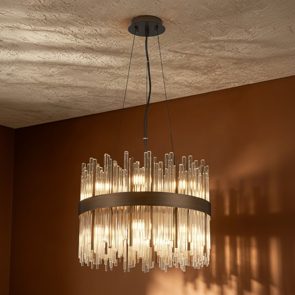 Round chandelier with clear glass rods and a dark bronze band