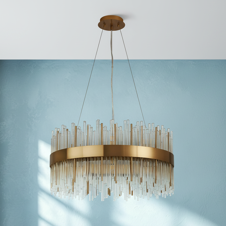 Round chandelier with a gold frame and clear glass rods hanging from it