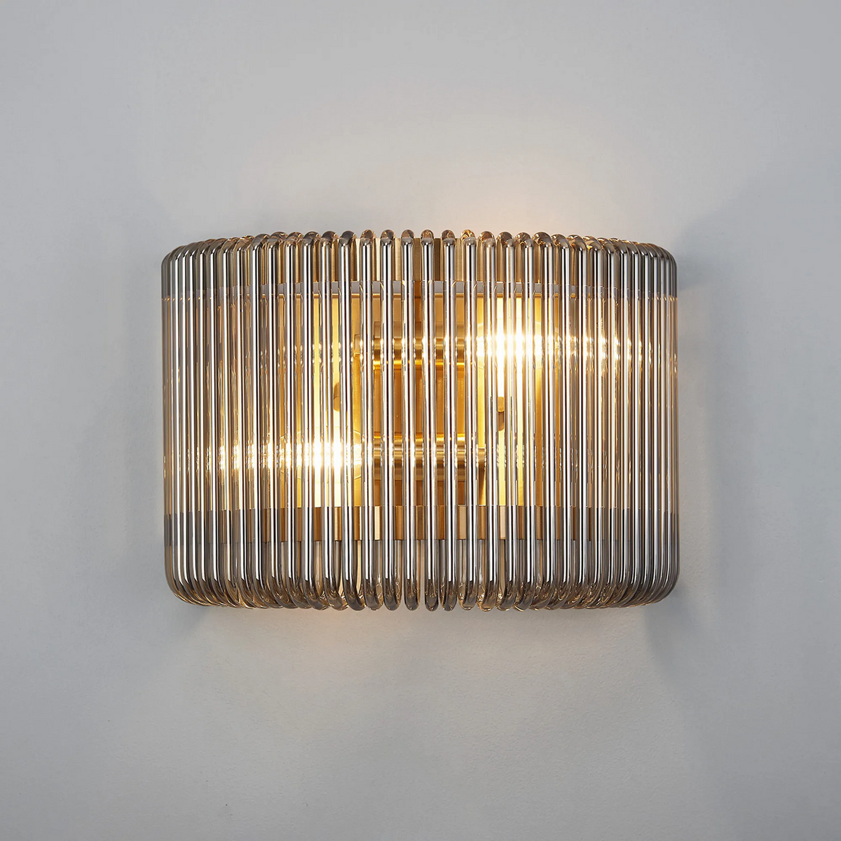 Lumiere Jevington medium wall light in brass with vertical smoked glass rods