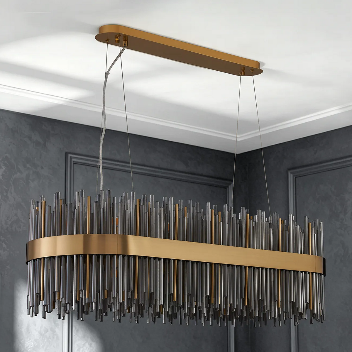 Rectangular chandelier with gold frame and clear and gold glass rods