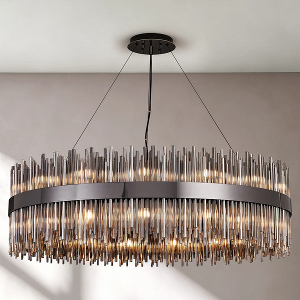 Large oval chandelier with hundreds of vertical glass rods in two tiers around a dark metal band
