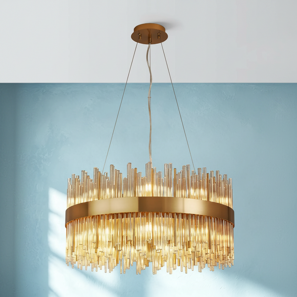 Round chandelier with gold frame and amber glass rods