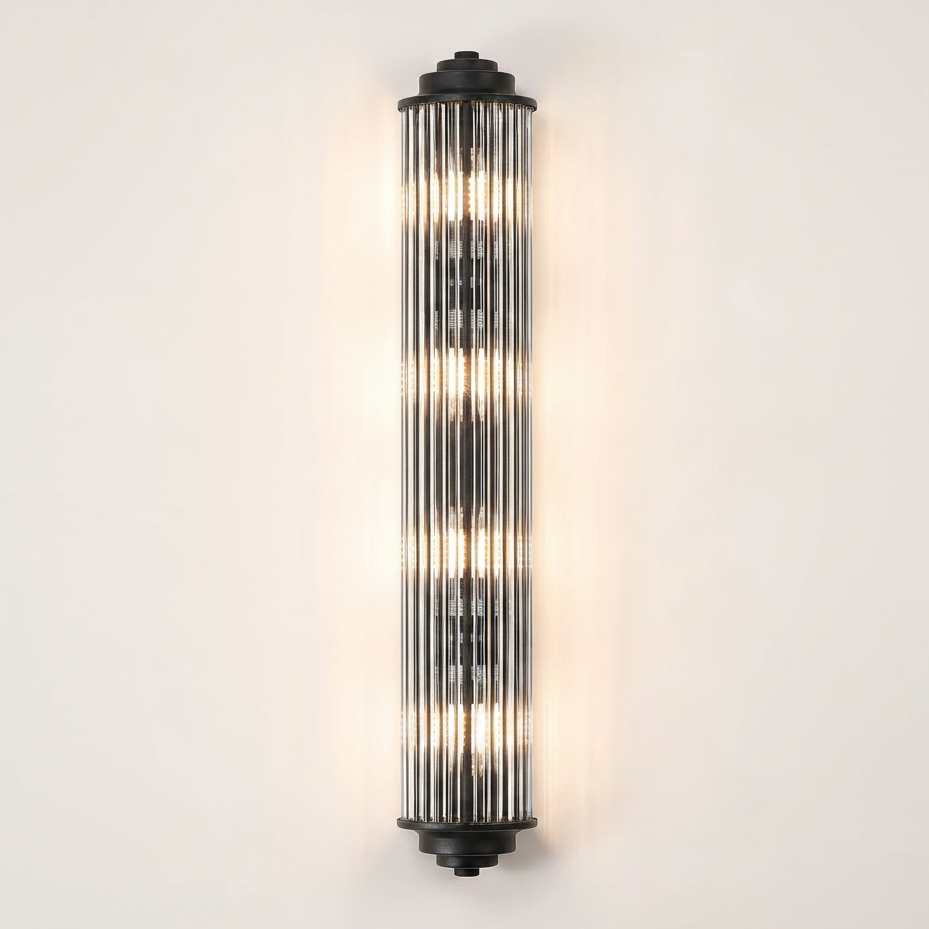 Vertical fluted glass wall light with black metal caps