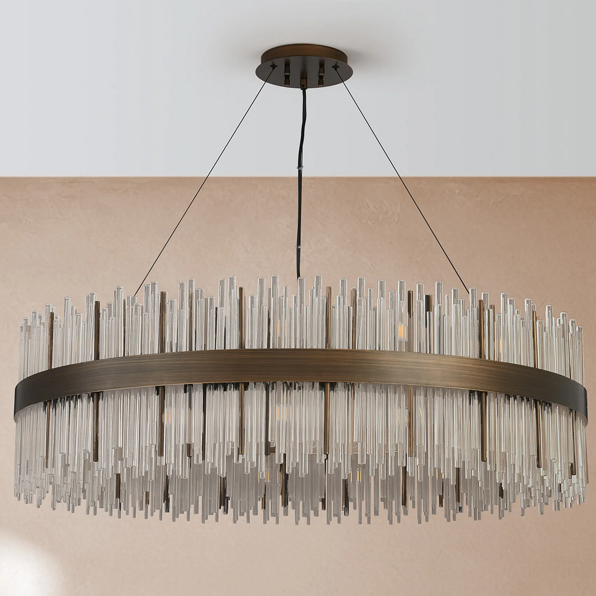 Round chandelier with bronze frame and clear glass rods