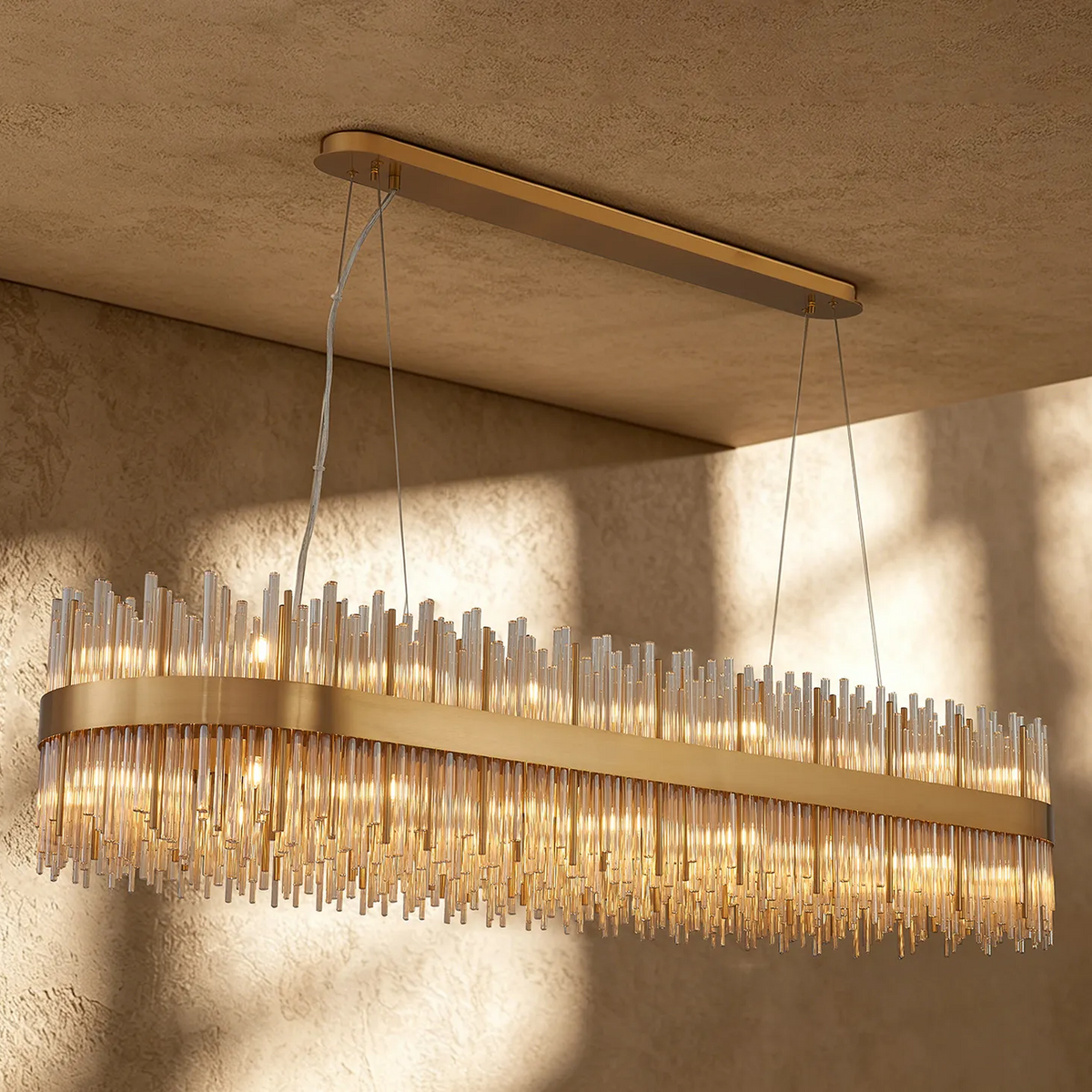 Rectangular chandelier with gold frame and vertical glass rods