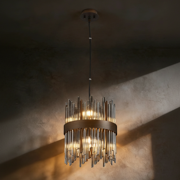Bronze and glass chandelier with multiple vertical glass rods and three illuminated bulbs