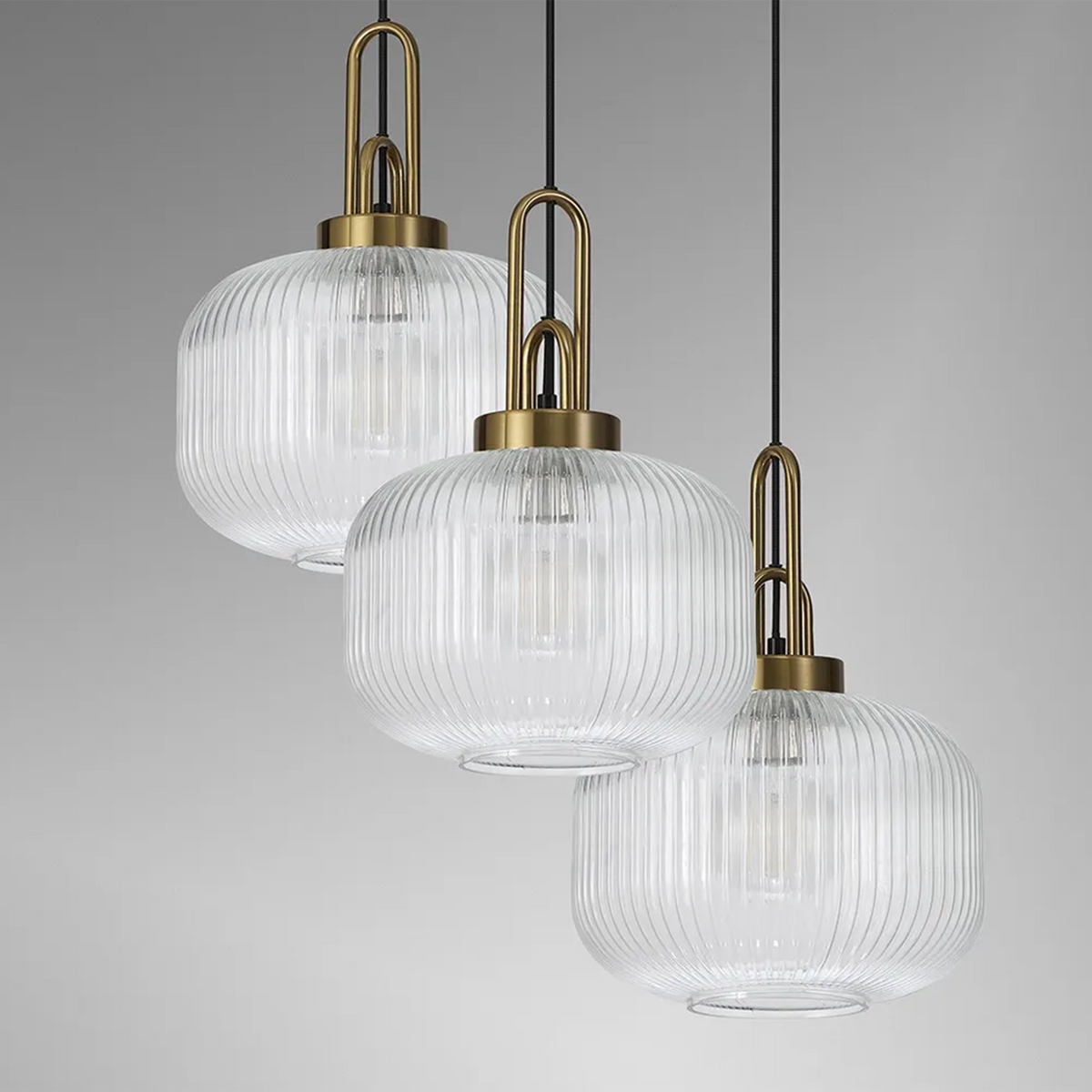 Atherington Pumpkin 3 Drop Pendant in Brass Gold with Ribbed Clear Shade
