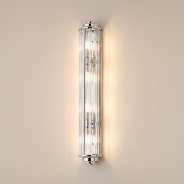 Polished nickel wall light with fluted glass shade