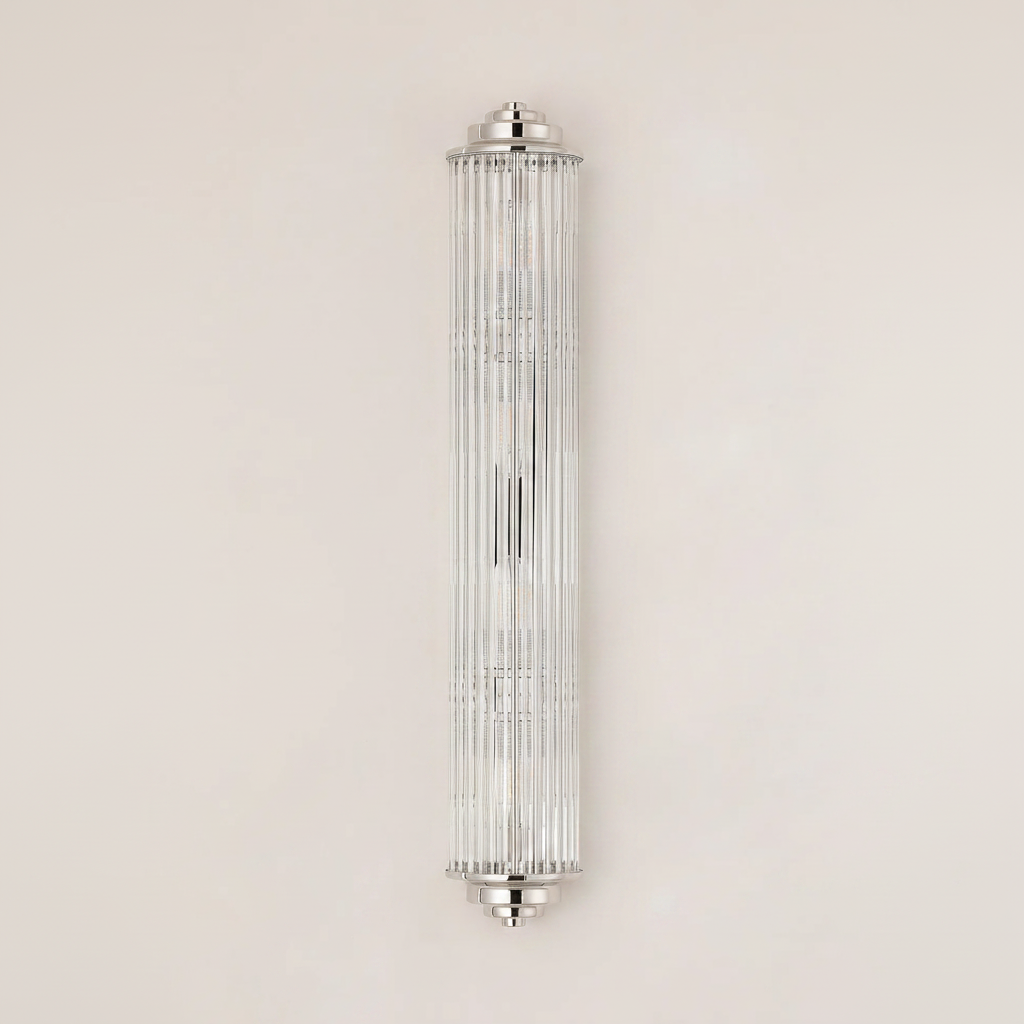 Tall cylindrical wall sconce with ribbed glass and polished nickel accents