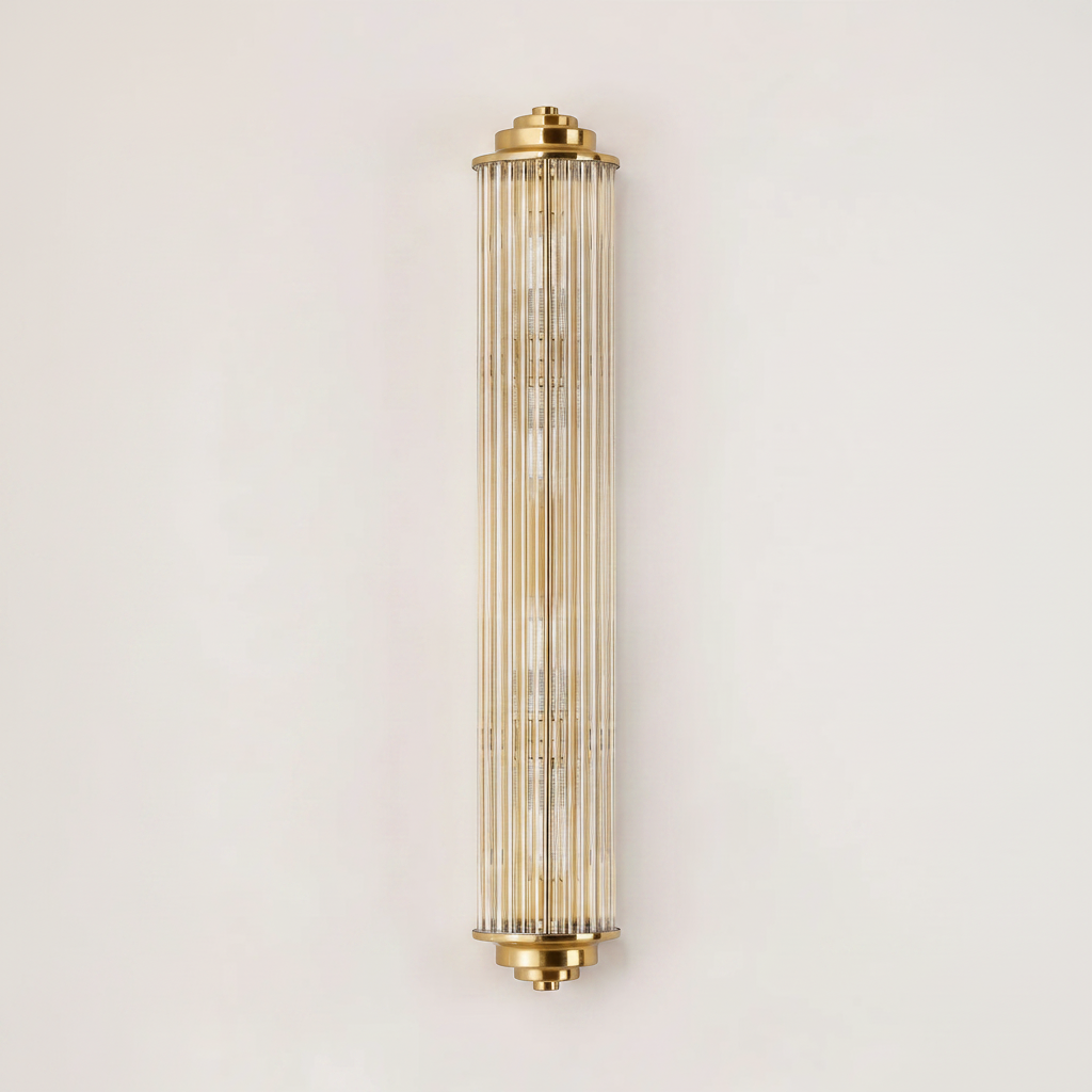 Tall cylindrical wall sconce with ribbed glass and brass accents