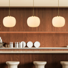 Milton Medium Oval Ball Pendant in Aged Brass & Frosted White Shade
