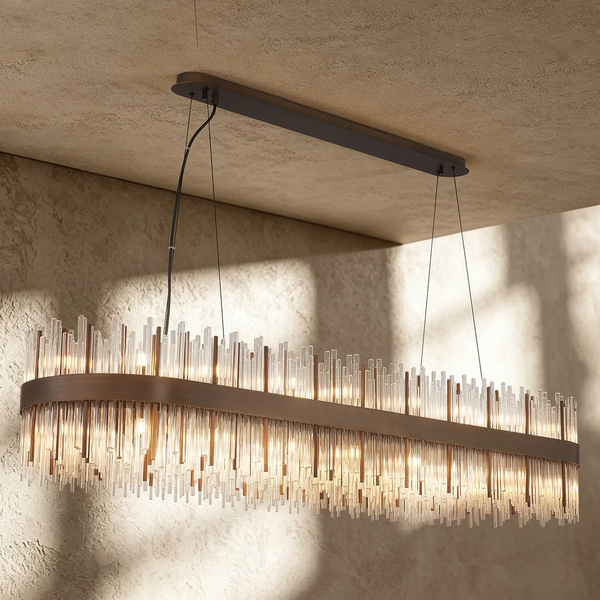Rectangular chandelier with bronze frame and multiple clear glass rods hanging down