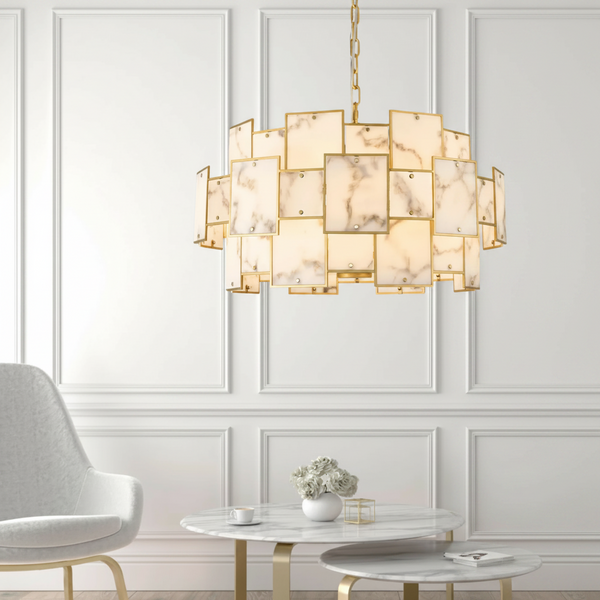 Gold chandelier with rectangular marble panels hanging from a chain