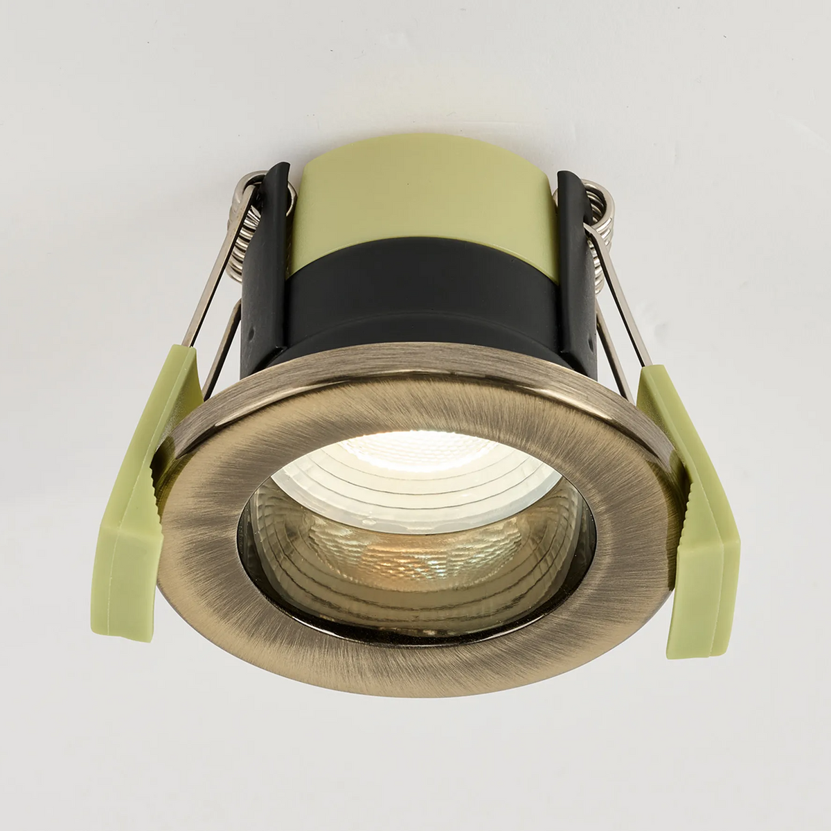 Antique brass downlight with a warm white light