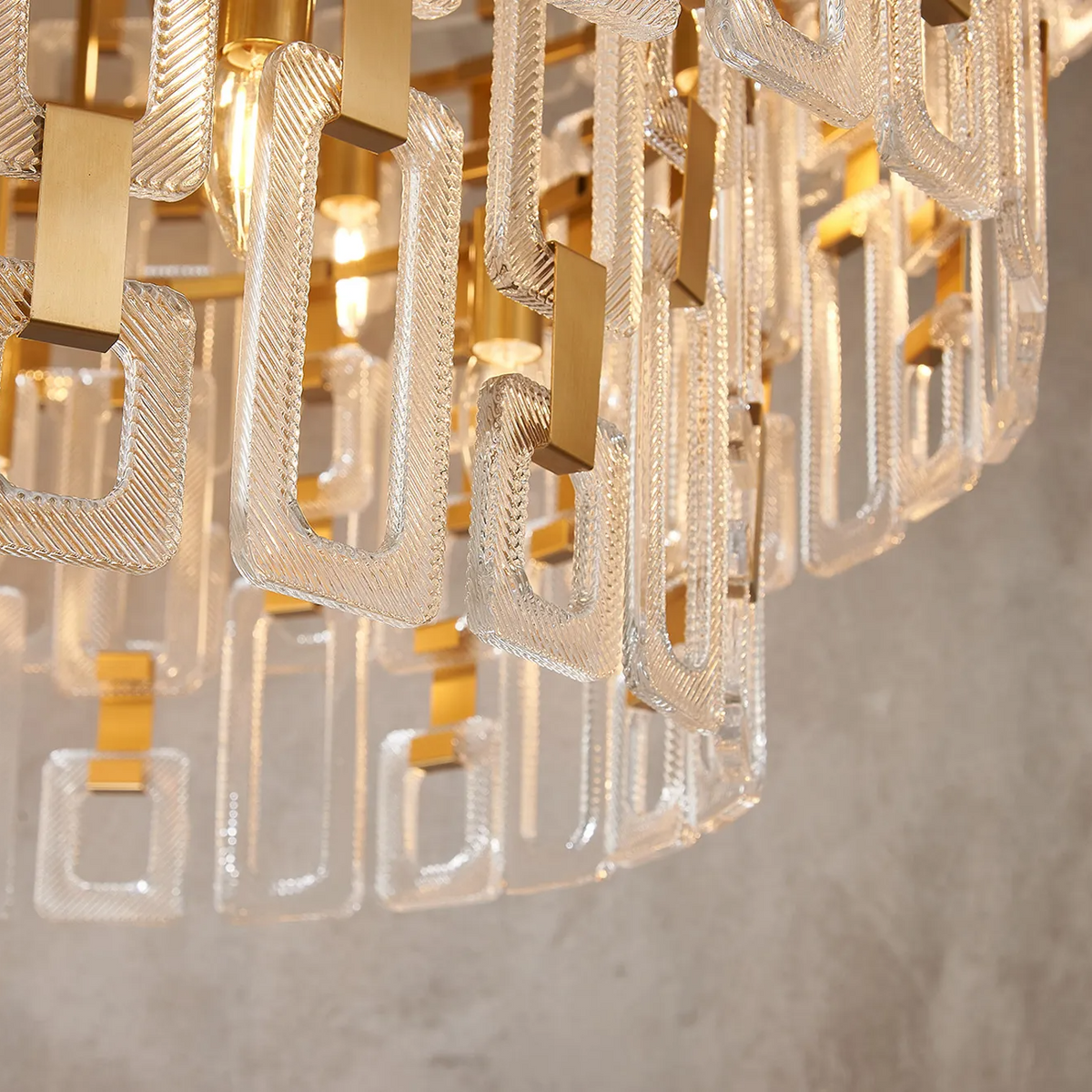 Heptonstall 1000mm Three Tier Round Pendant in Matt Gold with Clear Glass