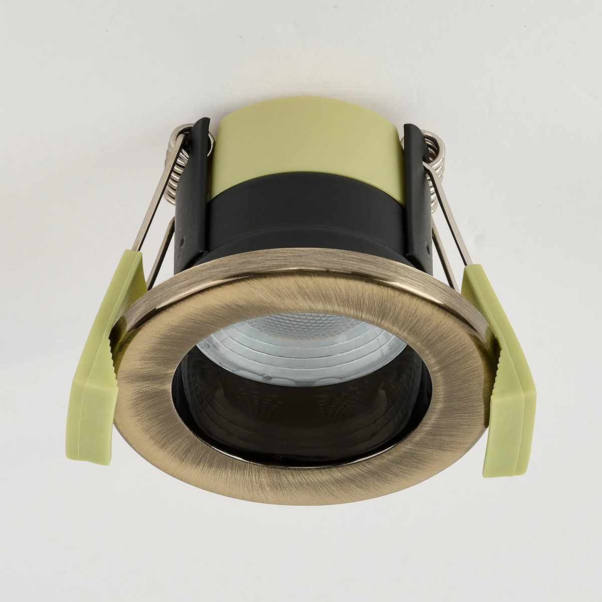 Antique brass downlight with a cool white light