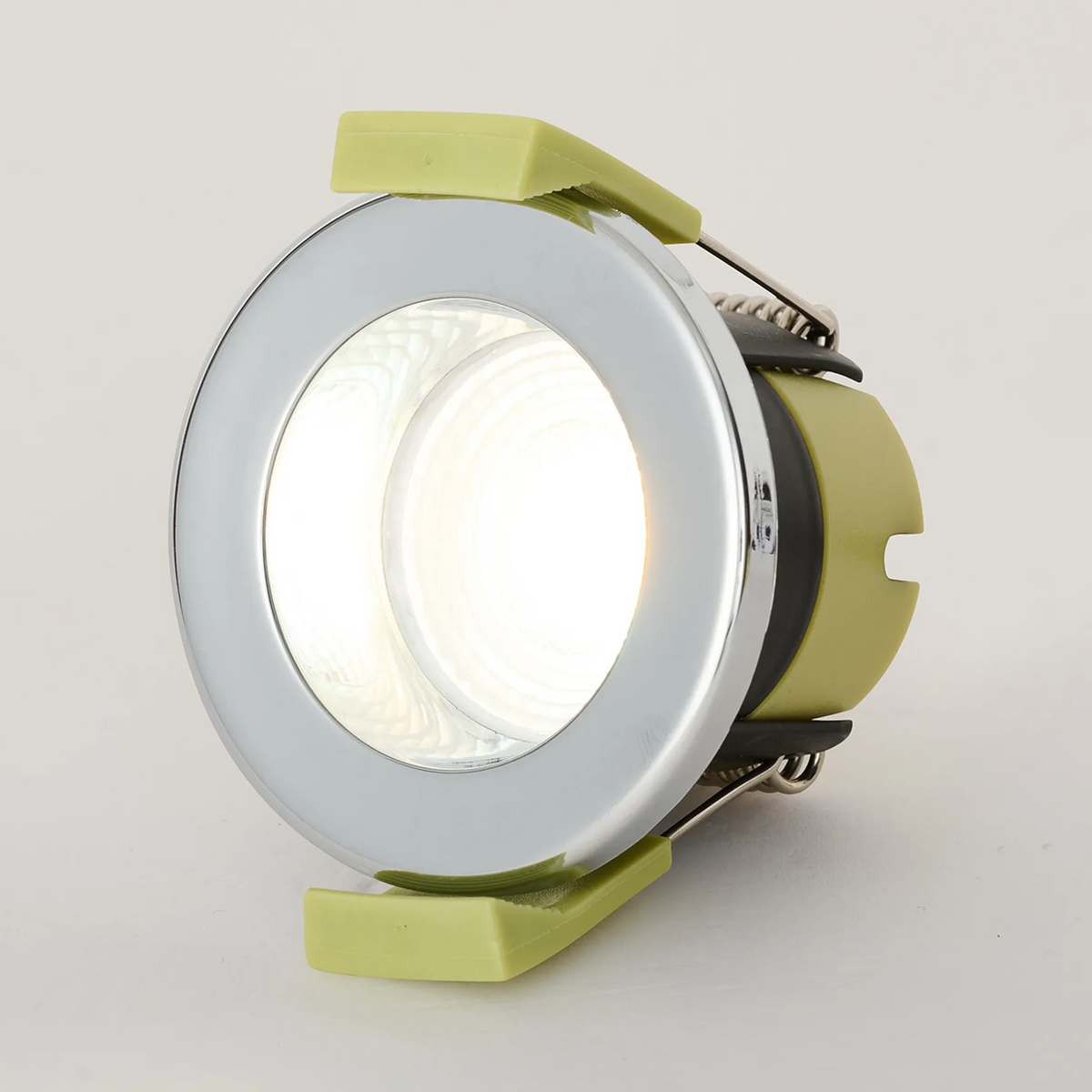 Chrome recessed downlight with warm white light, side view