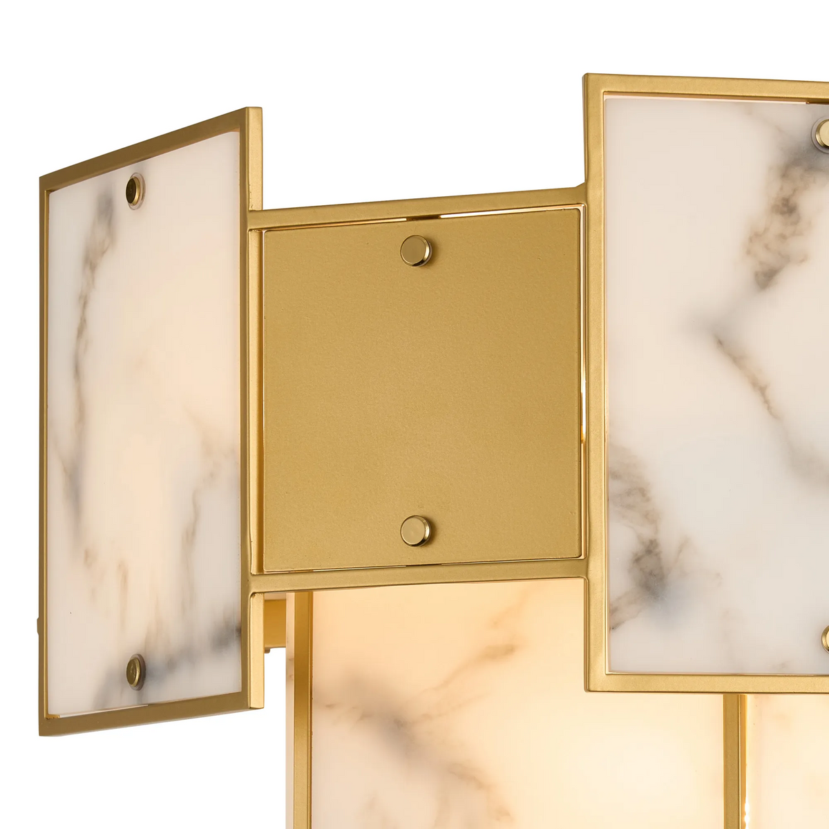 Close up of a gold and marble wall light