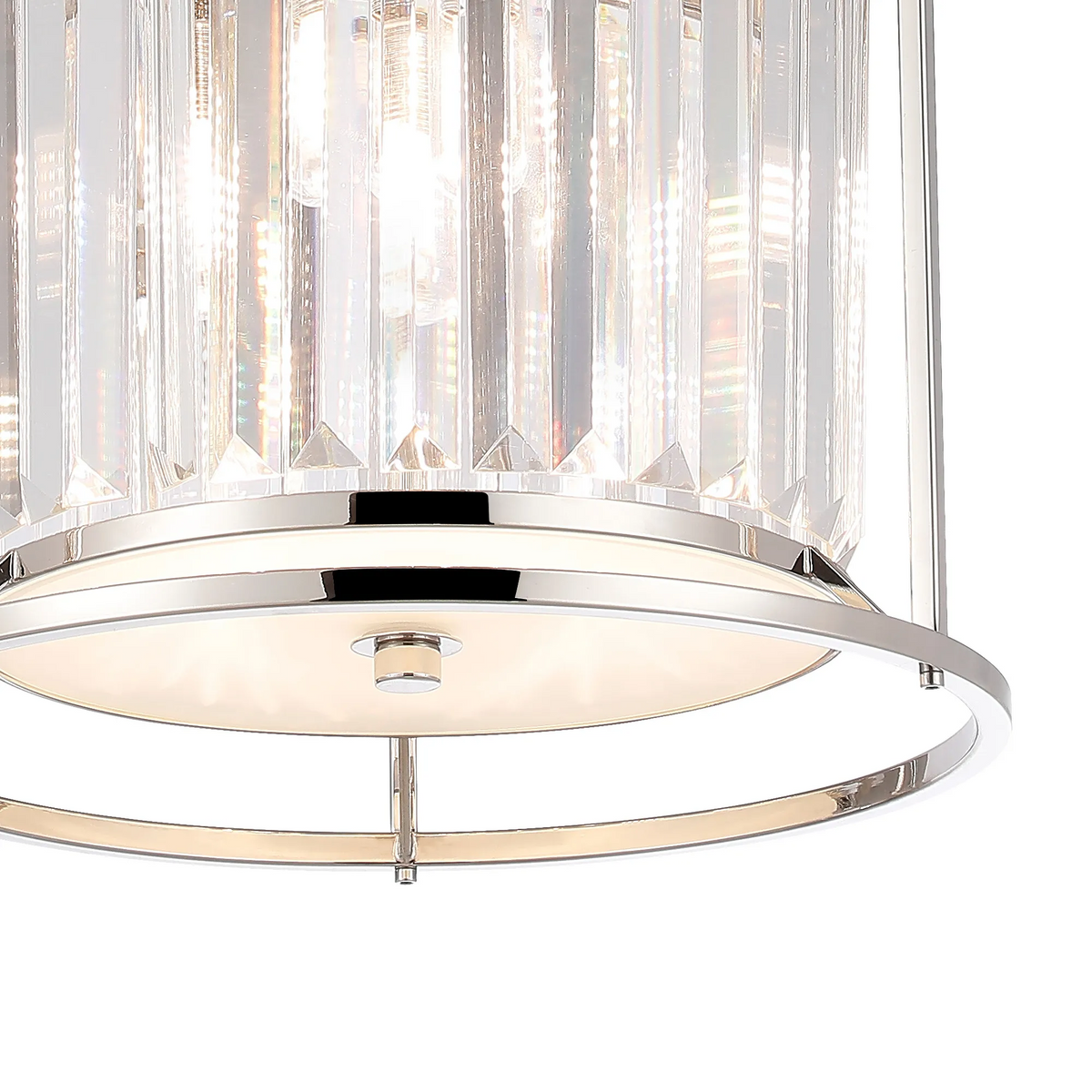Close up of a polished chrome and crystal chandelier with lights on