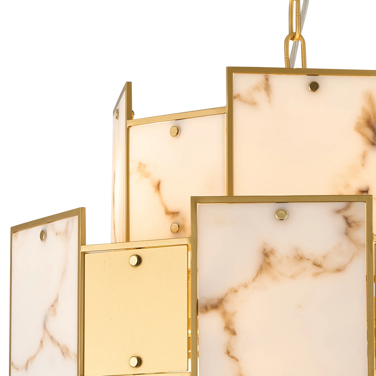 Close up of a chandelier with gold metal frames and rectangular marble panels
