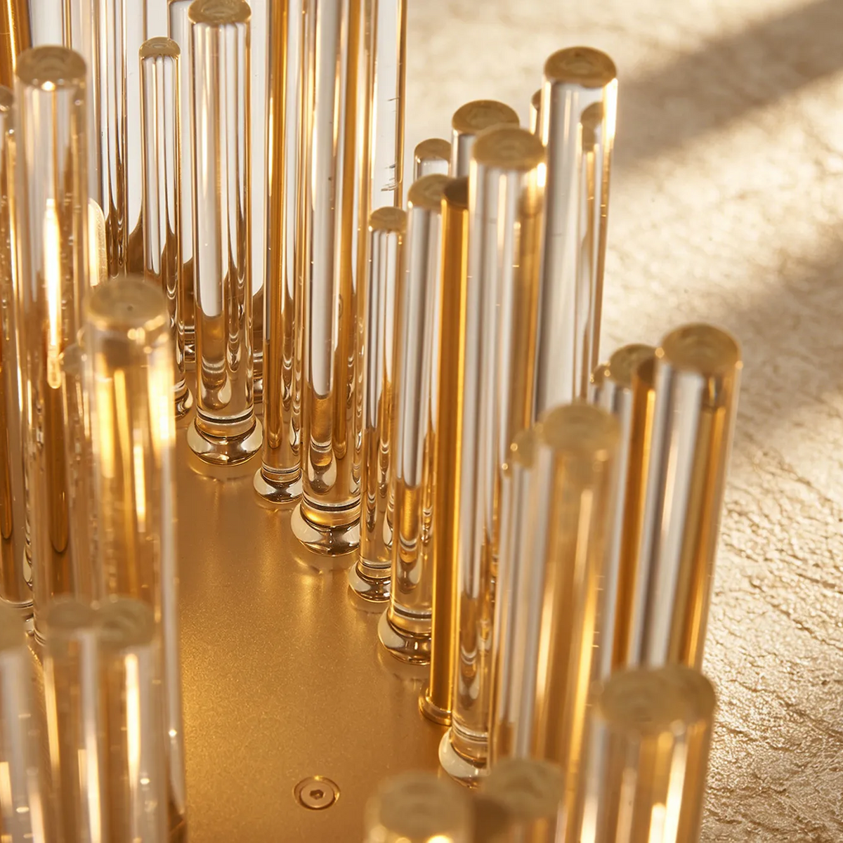Close up of a gold and clear glass chandelier