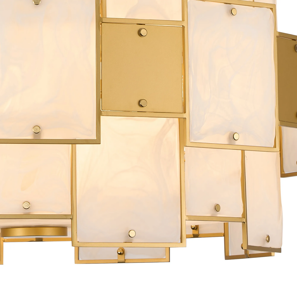 Close up of a gold chandelier with white rectangular panels