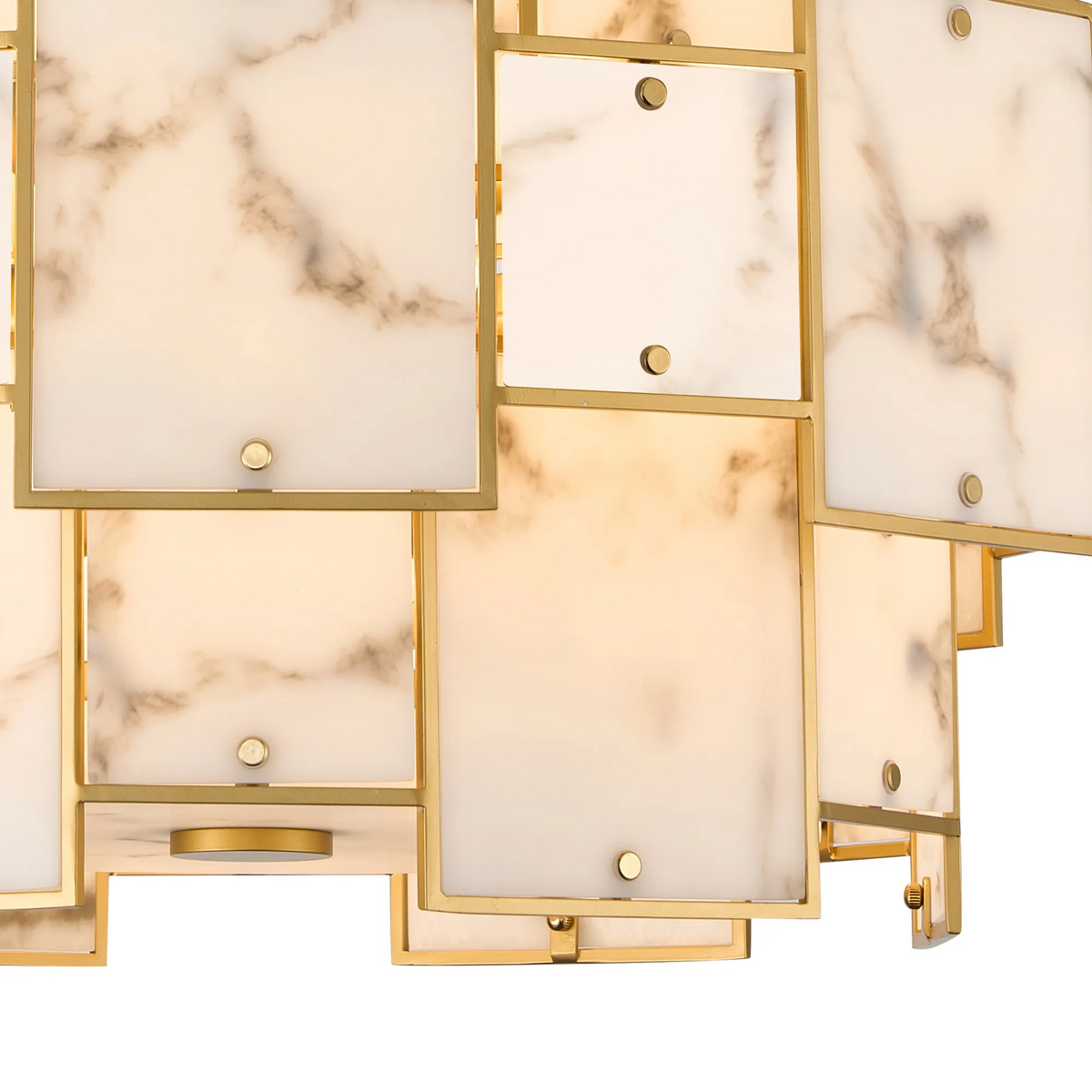 Close up of a gold chandelier with square marble panels