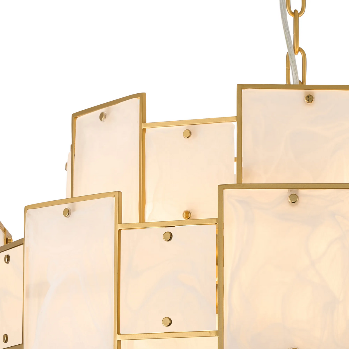 Close up of a gold chandelier with rectangular white glass panels