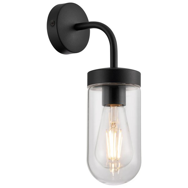 Black wall light with a curved arm and a clear glass shade enclosing an Edison bulb