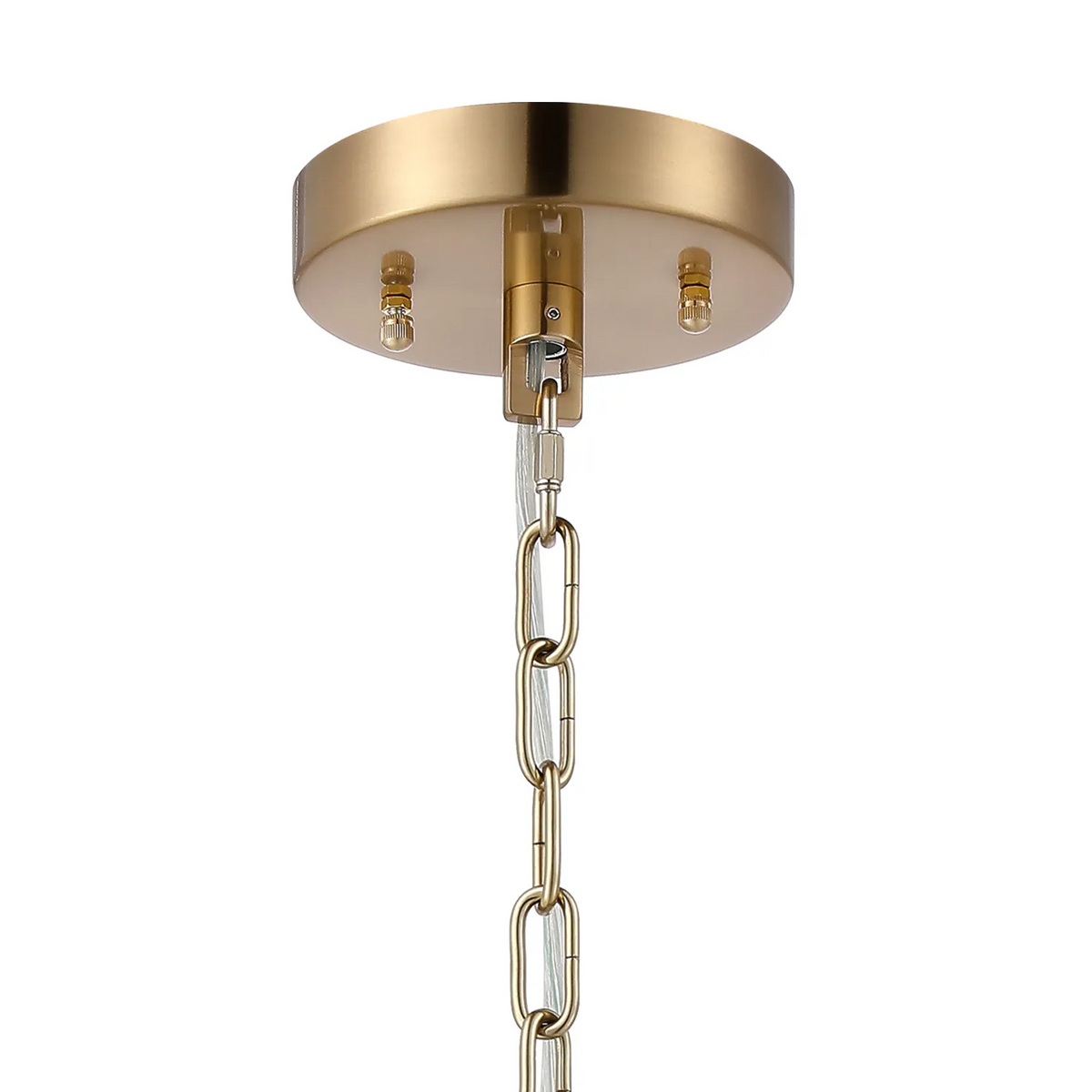 Close up of the top of a gold chandelier with a gold chain and clear wire hanging from it