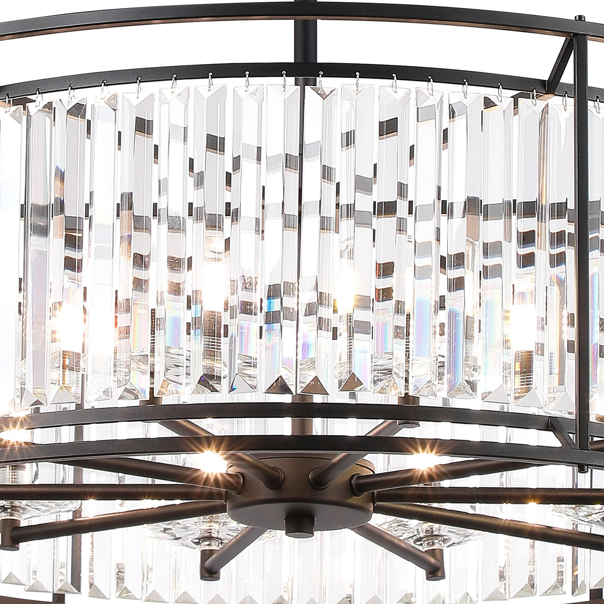 Close-up of a black chandelier with clear rectangular crystal accents and glowing lights