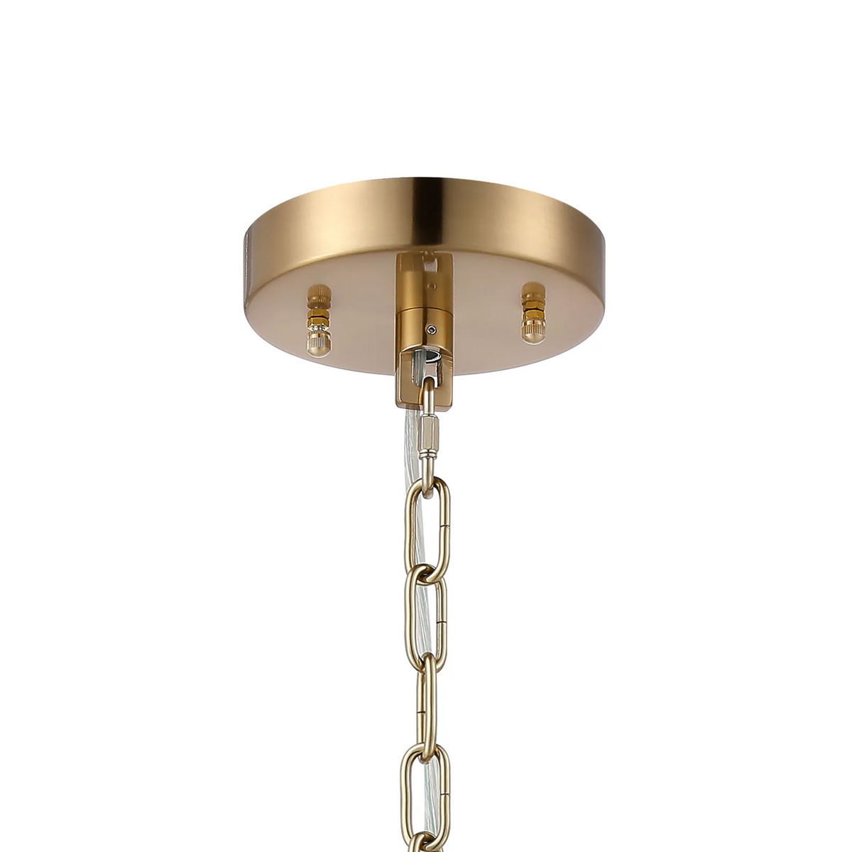 Close-up of a gold ceiling canopy with a matching chain and clear electrical cord