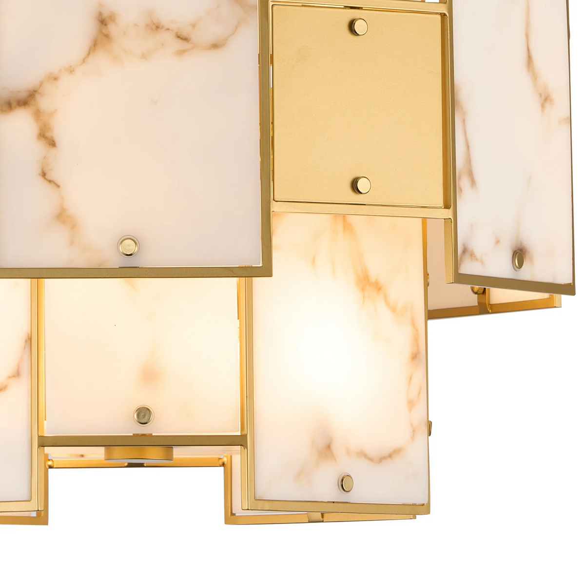 Close-up of a gold and marble chandelier with illuminated panels