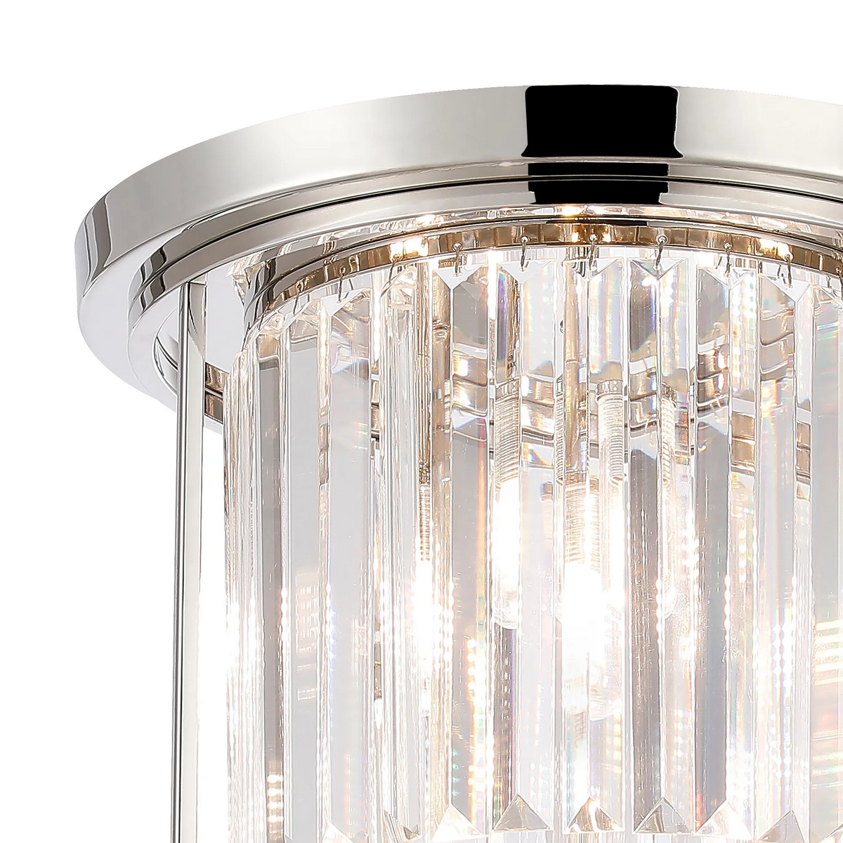 Close up of a polished chrome ceiling light with a cylindrical shade made of vertical crystal rods