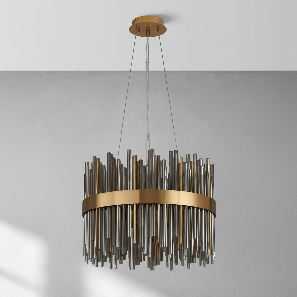 Round chandelier with a gold band and varying lengths of clear and gold glass rods