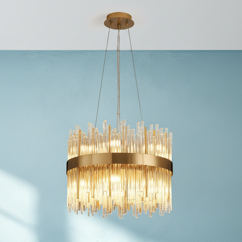 Round chandelier with a gold frame and clear glass rods of varying lengths