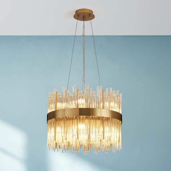 Round chandelier with a gold frame and clear glass rods of varying lengths