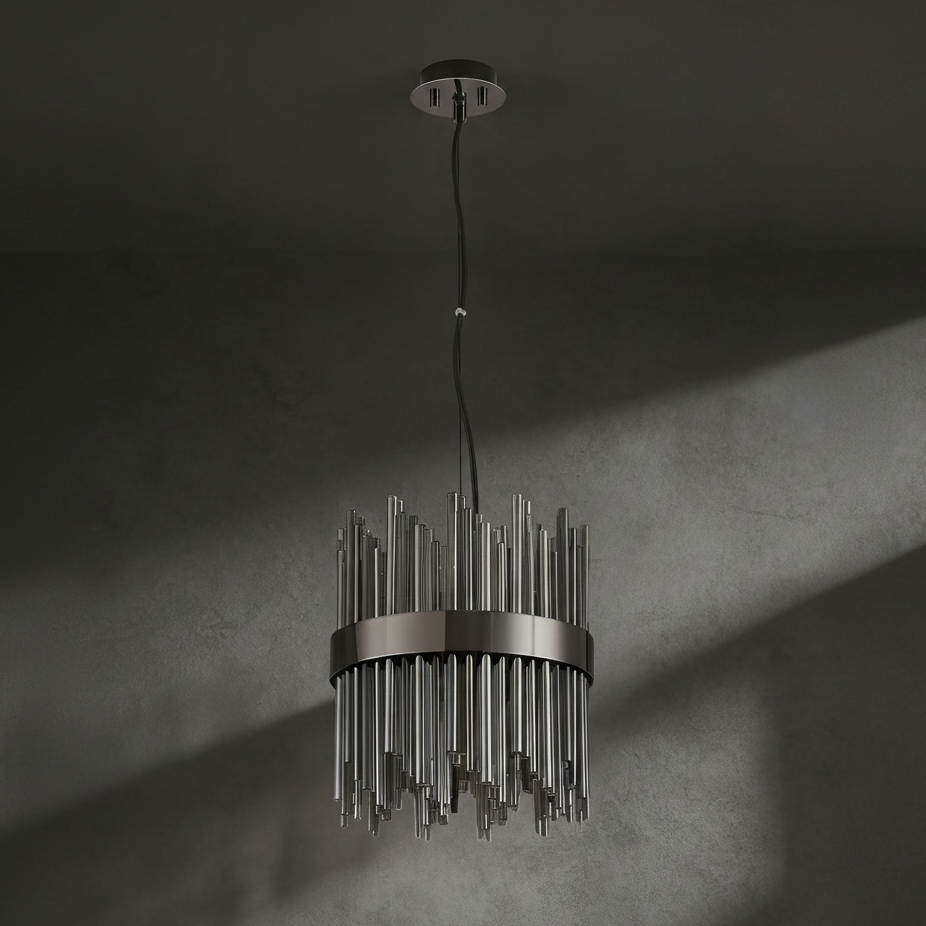 Modern chandelier with dark metal frame and clear glass rods hanging from a dark ceiling
