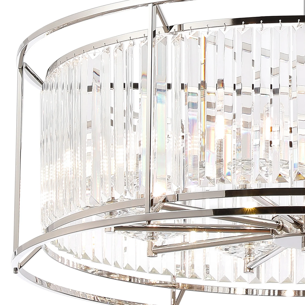 Close-up of a crystal chandelier with rectangular prisms and chrome accents
