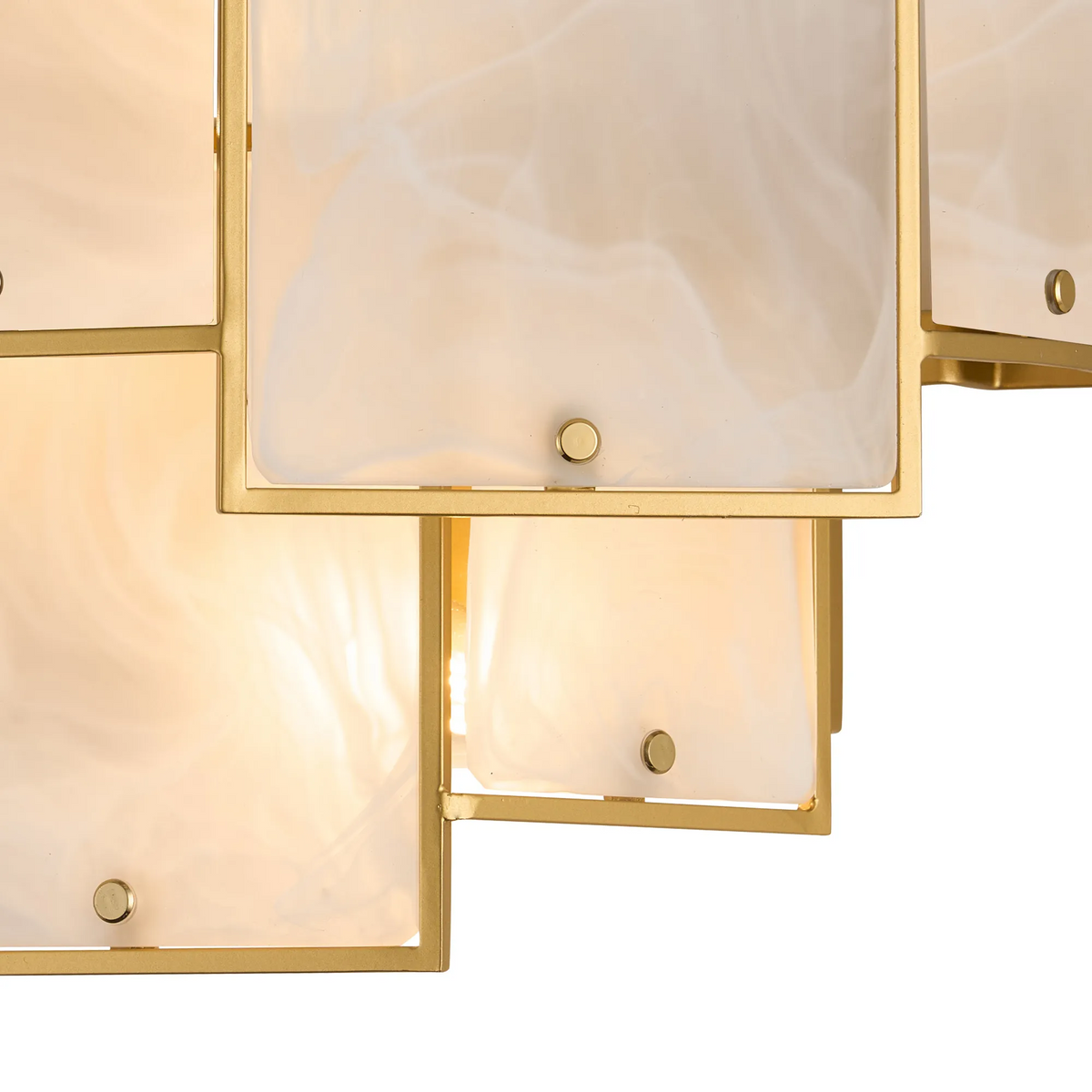 Close up of a gold chandelier with rectangular white alabaster panels