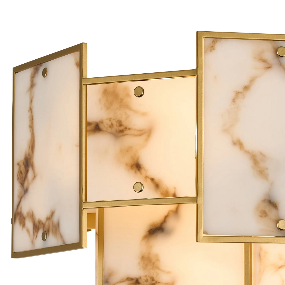 Close up of a gold framed light fixture with rectangular white marble panels