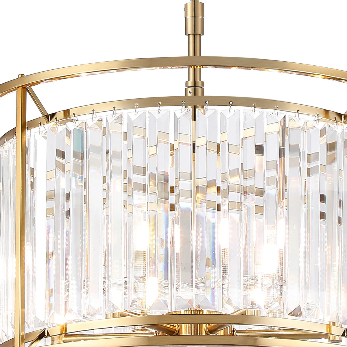 Close-up of a gold chandelier with clear rectangular crystal accents