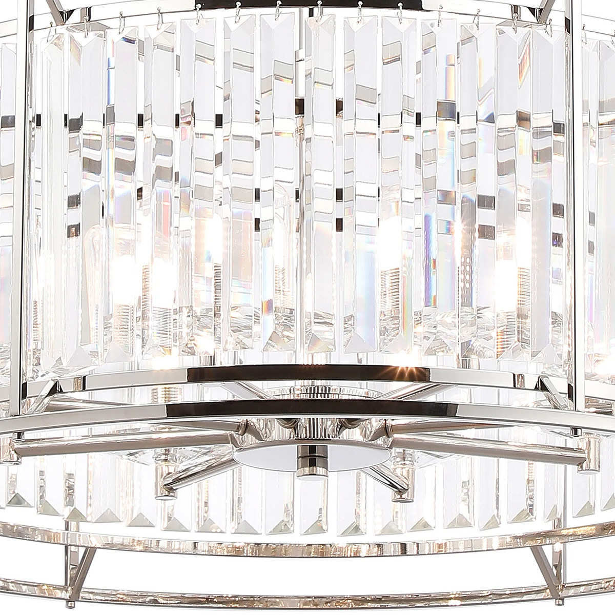 Close up of a crystal chandelier with rectangular prisms and a polished chrome frame