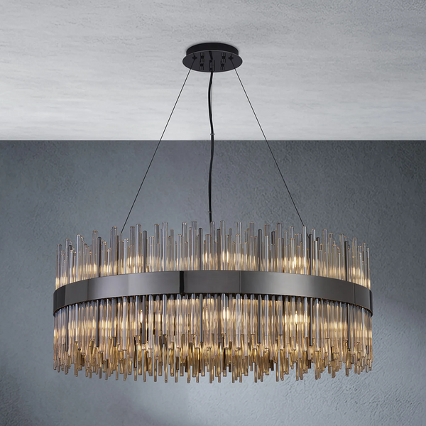 Round chandelier with clear glass rods and a dark metal band