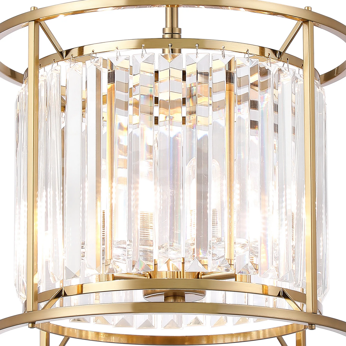 Close up of a gold chandelier with clear rectangular crystal accents