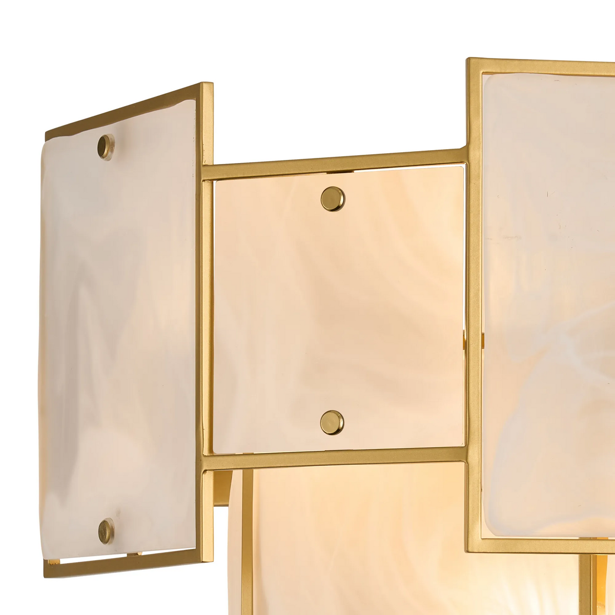 Close up of a gold framed light fixture with translucent rectangular panels