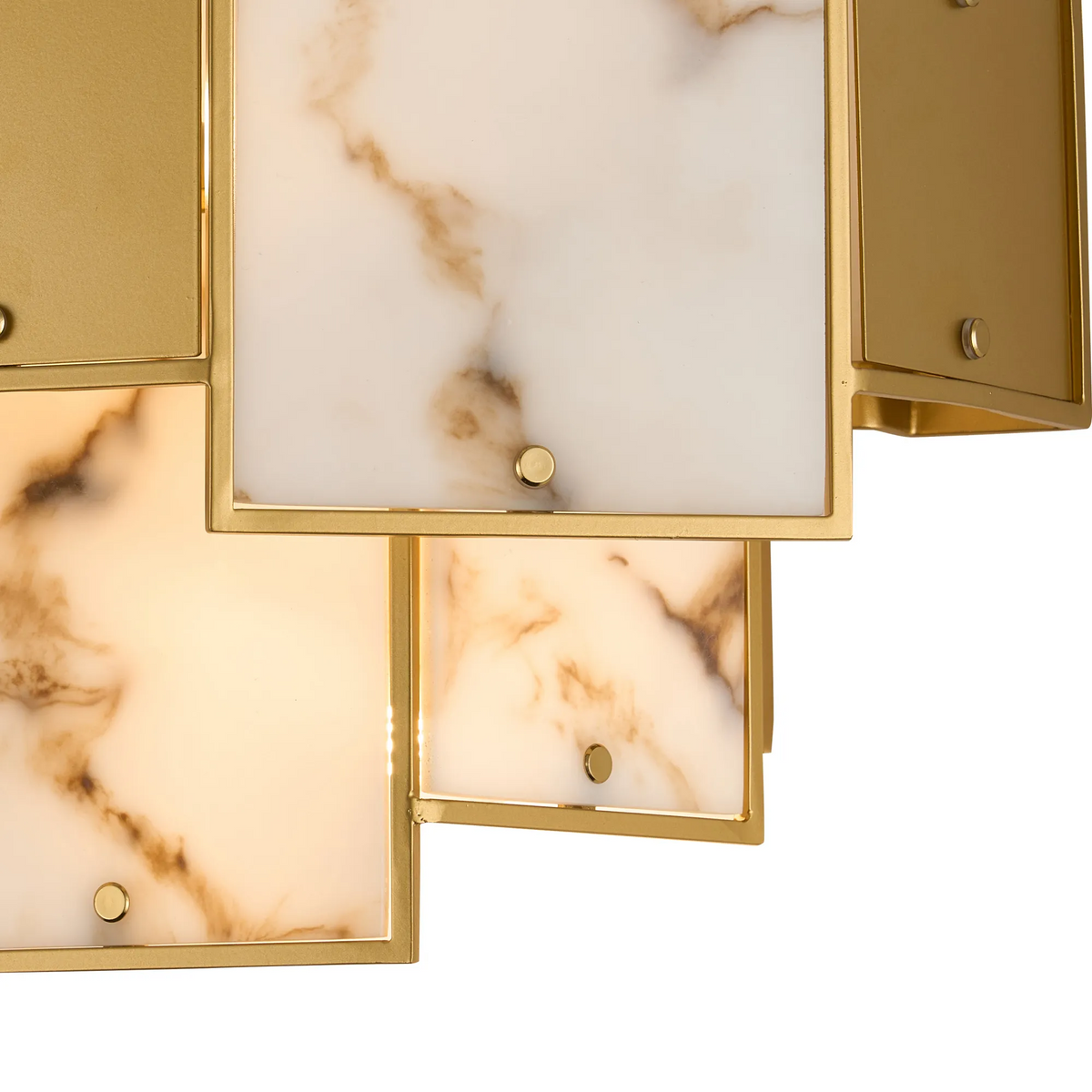 Close up of a gold and marble light fixture