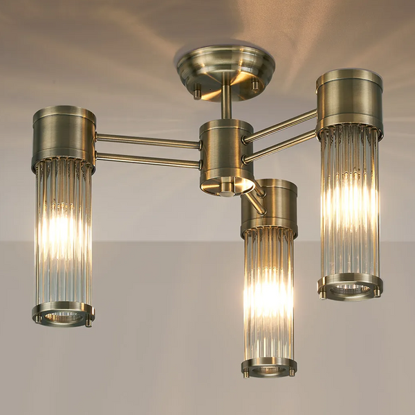 Tansley E14 IP44 Three Light Semi Flush Ceiling Light in Antique Brass with Clear Glass Rods