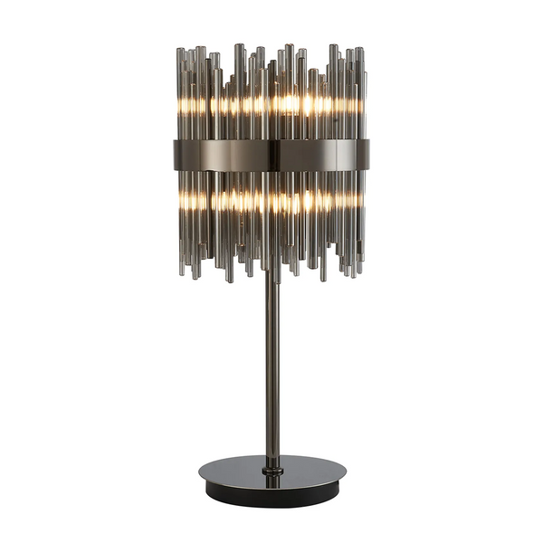 Table lamp with a dark metal base and stem, featuring a cylindrical shade made of vertical glass rods